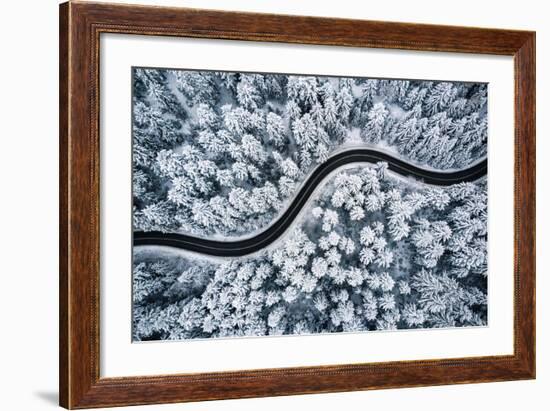 Curvy Windy Road in Snow Covered Forest, Top down Aerial View.-null-Framed Photographic Print