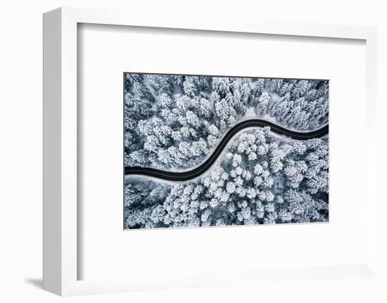 Curvy Windy Road in Snow Covered Forest, Top down Aerial View.-null-Framed Photographic Print