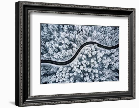 Curvy Windy Road in Snow Covered Forest, Top down Aerial View.-null-Framed Photographic Print