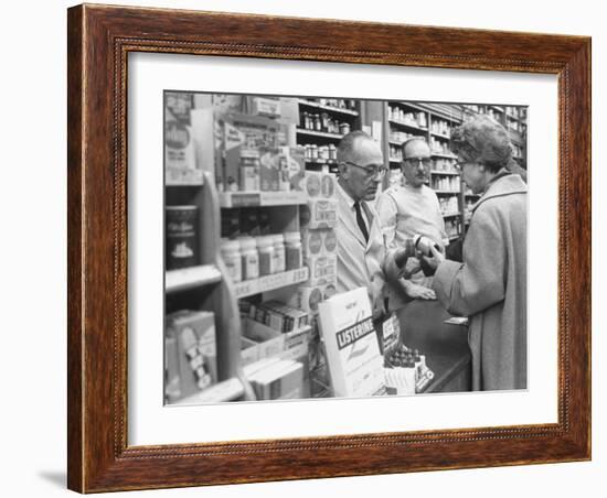 Customer Buying Tranquilizers at Drug Store-Ralph Morse-Framed Photographic Print