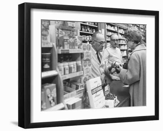 Customer Buying Tranquilizers at Drug Store-Ralph Morse-Framed Photographic Print