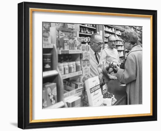 Customer Buying Tranquilizers at Drug Store-Ralph Morse-Framed Photographic Print