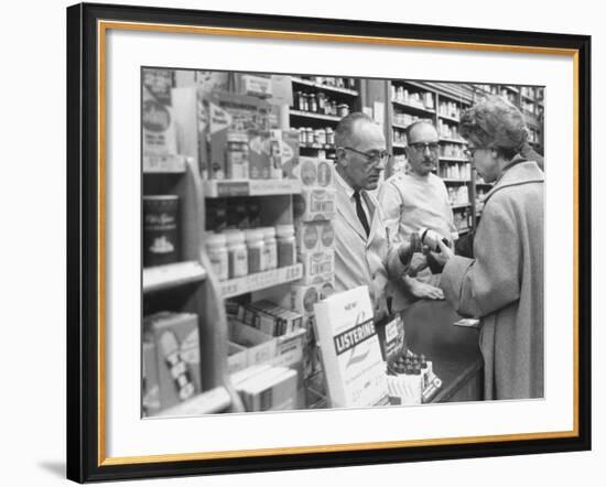 Customer Buying Tranquilizers at Drug Store-Ralph Morse-Framed Photographic Print