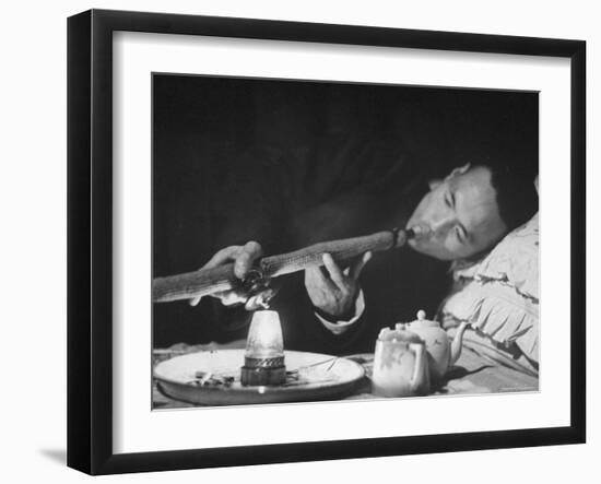 Customer Smoking Opium in an Opium Den-George Lacks-Framed Photographic Print