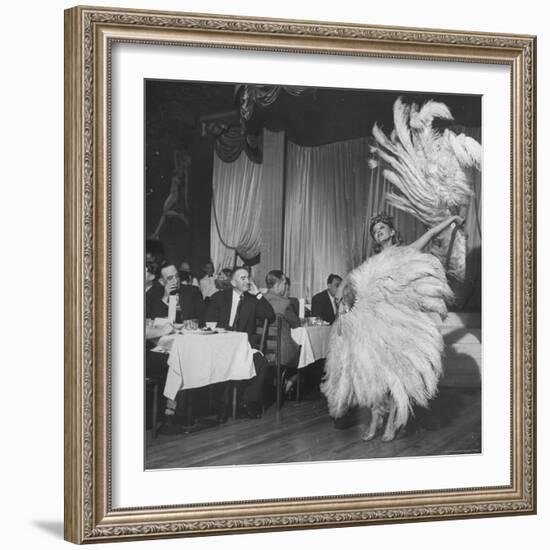 Customers at Sally Rand's Nightclub Watching a Dancer Performing the Midnight Fan Dance-Charles E^ Steinheimer-Framed Premium Photographic Print