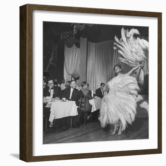 Customers at Sally Rand's Nightclub Watching a Dancer Performing the Midnight Fan Dance-Charles E^ Steinheimer-Framed Premium Photographic Print