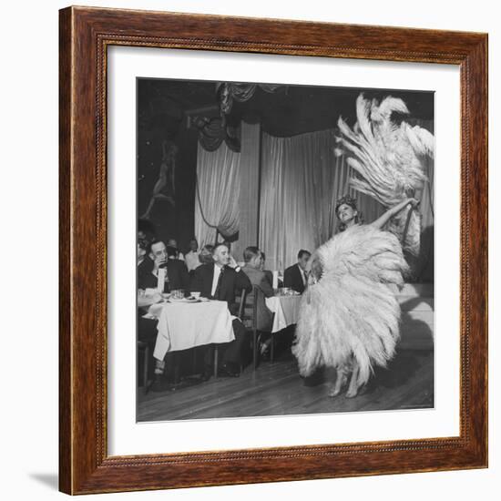 Customers at Sally Rand's Nightclub Watching a Dancer Performing the Midnight Fan Dance-Charles E^ Steinheimer-Framed Premium Photographic Print
