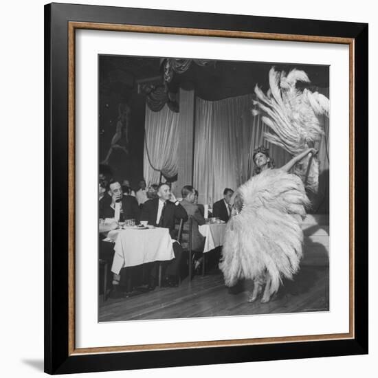 Customers at Sally Rand's Nightclub Watching a Dancer Performing the Midnight Fan Dance-Charles E^ Steinheimer-Framed Premium Photographic Print