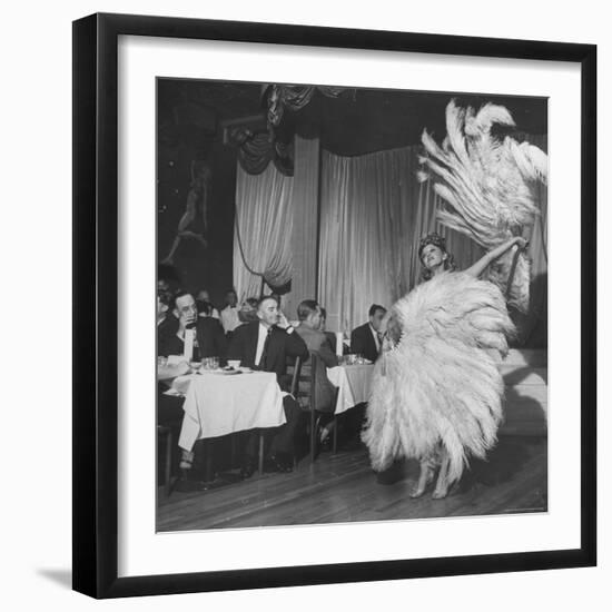 Customers at Sally Rand's Nightclub Watching a Dancer Performing the Midnight Fan Dance-Charles E^ Steinheimer-Framed Premium Photographic Print