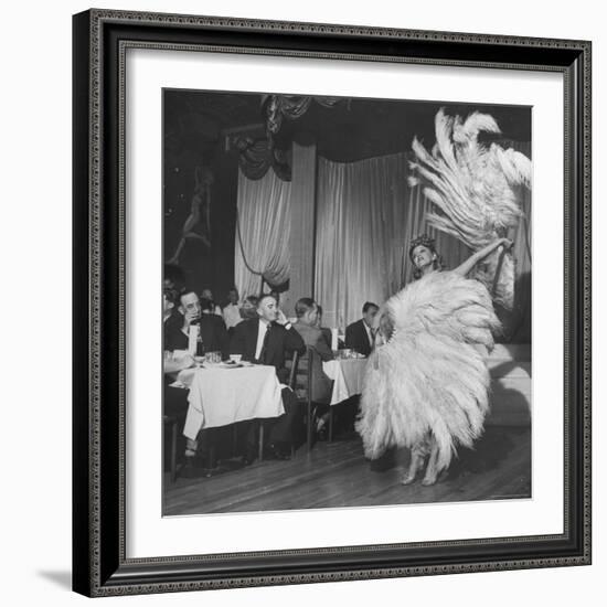 Customers at Sally Rand's Nightclub Watching a Dancer Performing the Midnight Fan Dance-Charles E^ Steinheimer-Framed Premium Photographic Print