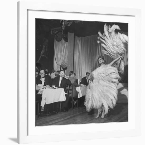 Customers at Sally Rand's Nightclub Watching a Dancer Performing the Midnight Fan Dance-Charles E^ Steinheimer-Framed Premium Photographic Print