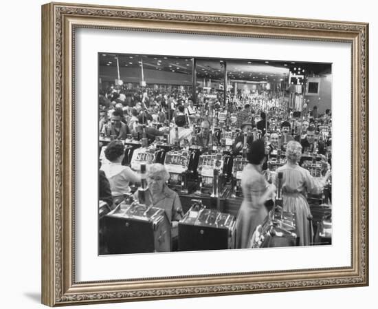 Customers at Slot Machines at Harrah's Nightclub-Nat Farbman-Framed Photographic Print