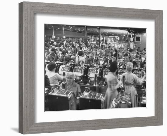 Customers at Slot Machines at Harrah's Nightclub-Nat Farbman-Framed Photographic Print