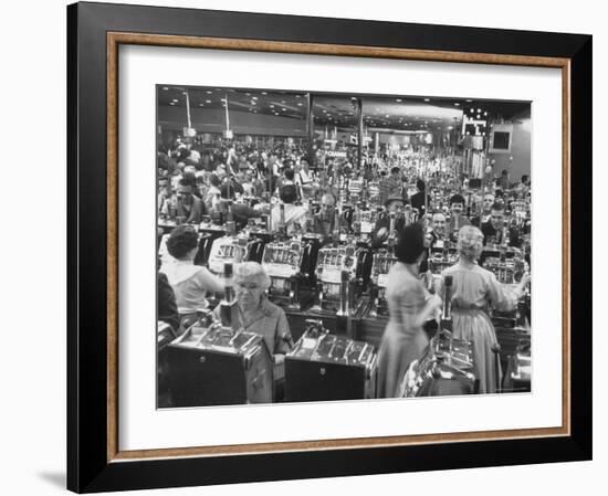 Customers at Slot Machines at Harrah's Nightclub-Nat Farbman-Framed Photographic Print