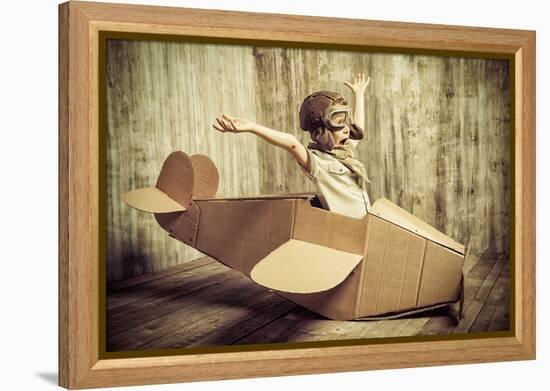 Cute Dreamer Boy Playing with a Cardboard Airplane. Childhood. Fantasy, Imagination. Retro Style.-prometeus-Framed Premier Image Canvas