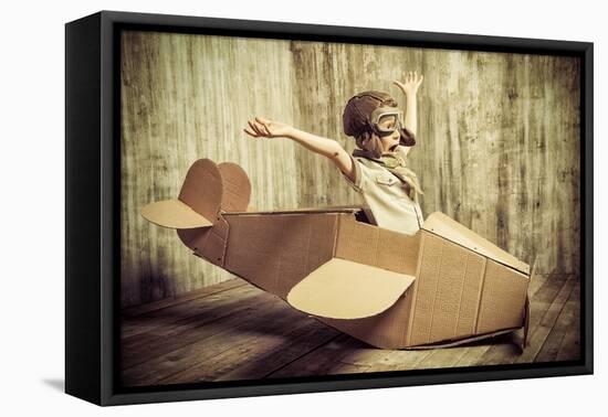 Cute Dreamer Boy Playing with a Cardboard Airplane. Childhood. Fantasy, Imagination. Retro Style.-prometeus-Framed Premier Image Canvas