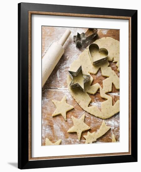 Cutting Out Heart-Shaped and Star-Shaped Biscuits-null-Framed Photographic Print