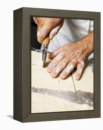 Cutting Pasta Dough into Strips with Pastry Wheel-null-Framed Premier Image Canvas