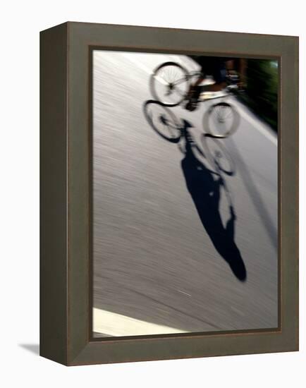 Cyclist and His Shadow-Chris Trotman-Framed Premier Image Canvas