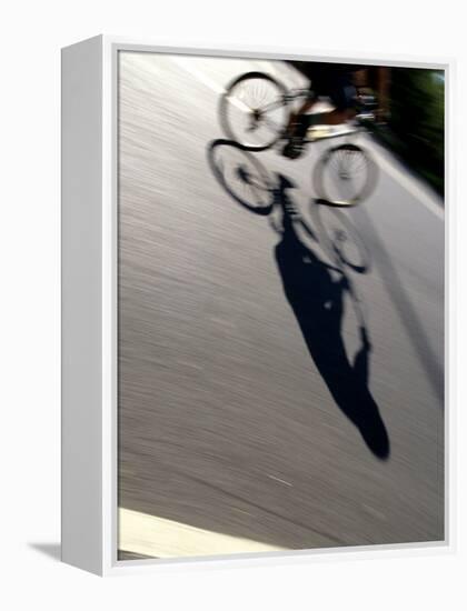 Cyclist and His Shadow-Chris Trotman-Framed Premier Image Canvas