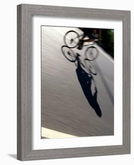 Cyclist and His Shadow-Chris Trotman-Framed Photographic Print