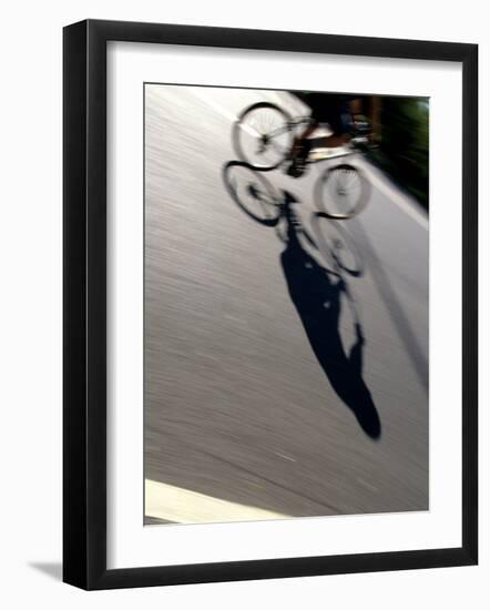 Cyclist and His Shadow-Chris Trotman-Framed Photographic Print