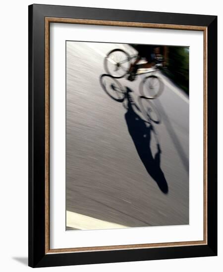 Cyclist and His Shadow-Chris Trotman-Framed Photographic Print