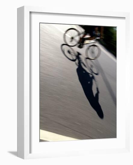 Cyclist and His Shadow-Chris Trotman-Framed Photographic Print