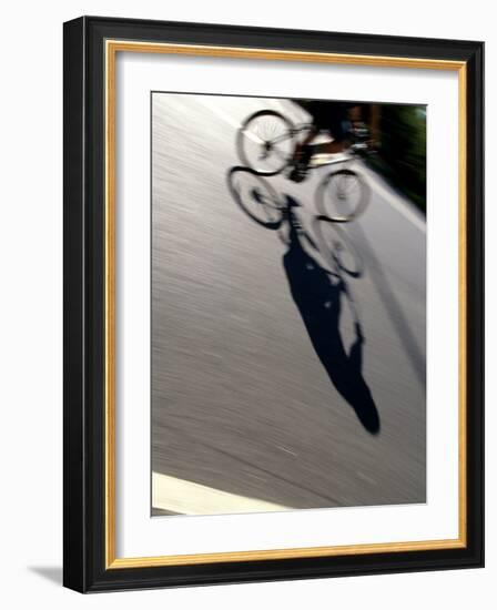Cyclist and His Shadow-Chris Trotman-Framed Photographic Print