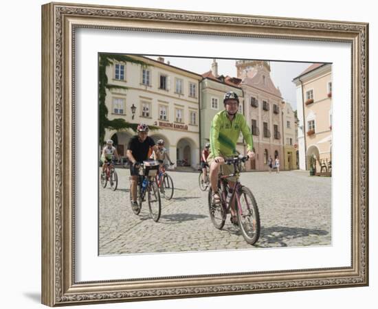 Cyclists Riding Through Namesti in Town of Mikulov, Brnensko Region-Richard Nebesky-Framed Photographic Print