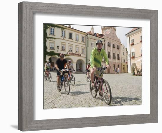 Cyclists Riding Through Namesti in Town of Mikulov, Brnensko Region-Richard Nebesky-Framed Photographic Print