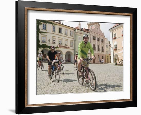 Cyclists Riding Through Namesti in Town of Mikulov, Brnensko Region-Richard Nebesky-Framed Photographic Print