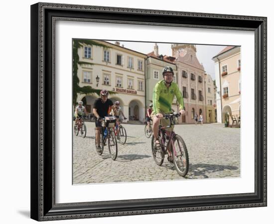 Cyclists Riding Through Namesti in Town of Mikulov, Brnensko Region-Richard Nebesky-Framed Photographic Print