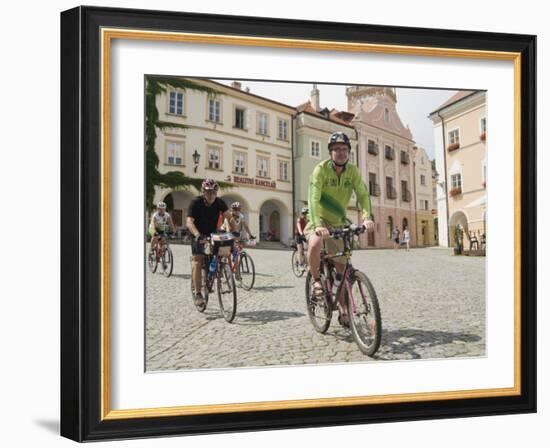 Cyclists Riding Through Namesti in Town of Mikulov, Brnensko Region-Richard Nebesky-Framed Photographic Print