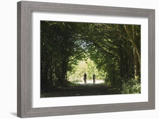Cyclists Tunnel-Charles Bowman-Framed Photographic Print
