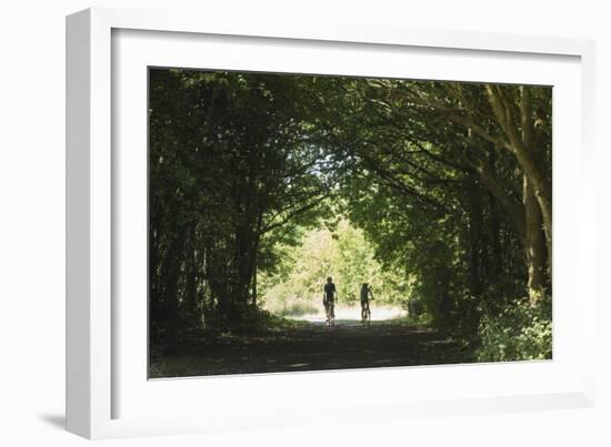 Cyclists Tunnel-Charles Bowman-Framed Photographic Print