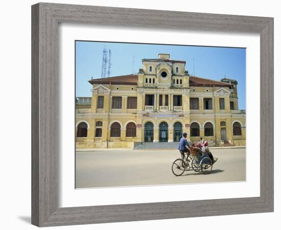 Cyclo Passing the Old Post Office in Phnom Penh in Cambodia, Indochina, Southeast Asia-Tim Hall-Framed Photographic Print