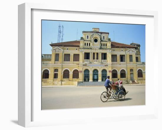 Cyclo Passing the Old Post Office in Phnom Penh in Cambodia, Indochina, Southeast Asia-Tim Hall-Framed Photographic Print