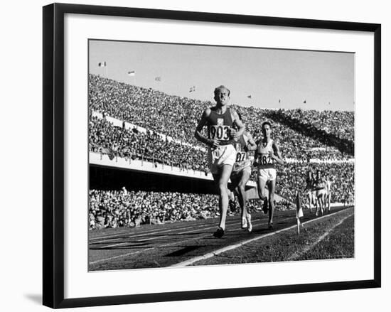 Czech Track and Field Gold Medalist Emil Zatopek, Leading Pack, Competing in 1952 Olympic Games-Mark Kauffman-Framed Premium Photographic Print