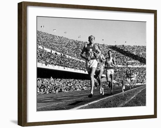 Czech Track and Field Gold Medalist Emil Zatopek, Leading Pack, Competing in 1952 Olympic Games-Mark Kauffman-Framed Premium Photographic Print
