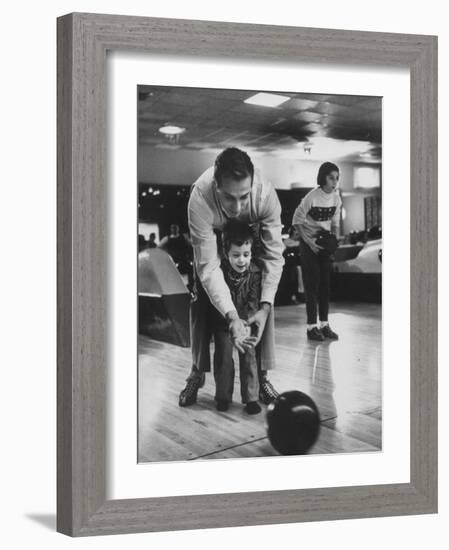 Dad Showing 3 Year Old Daughter the Basics of Bowling-George Silk-Framed Photographic Print