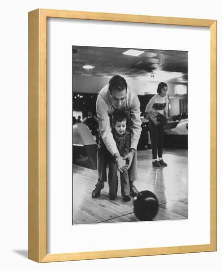 Dad Showing 3 Year Old Daughter the Basics of Bowling-George Silk-Framed Photographic Print