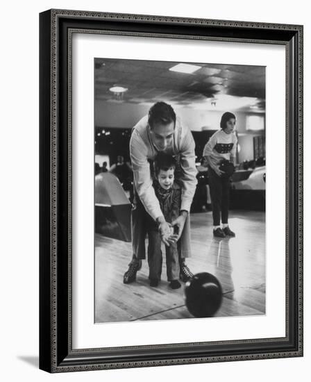 Dad Showing 3 Year Old Daughter the Basics of Bowling-George Silk-Framed Photographic Print