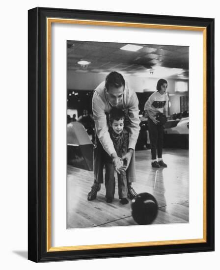 Dad Showing 3 Year Old Daughter the Basics of Bowling-George Silk-Framed Photographic Print