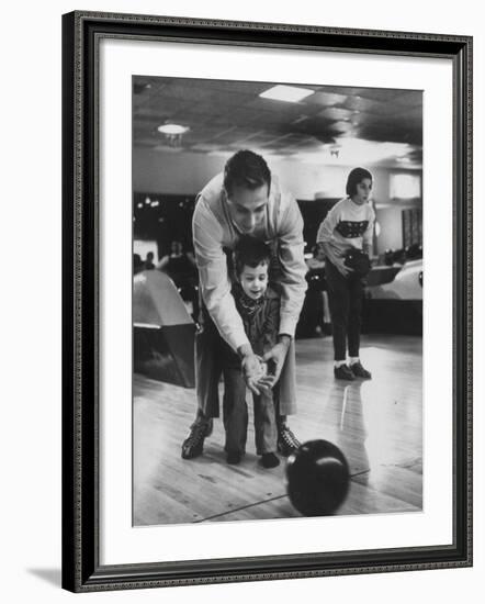 Dad Showing 3 Year Old Daughter the Basics of Bowling-George Silk-Framed Photographic Print
