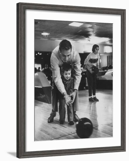 Dad Showing 3 Year Old Daughter the Basics of Bowling-George Silk-Framed Photographic Print