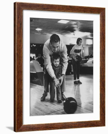 Dad Showing 3 Year Old Daughter the Basics of Bowling-George Silk-Framed Photographic Print