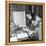 Dalida Ccooking in Her Kitchen-Marcel Begoin-Framed Premier Image Canvas
