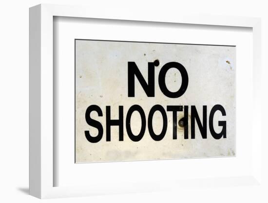 Damaged No Shooting Sign-Mr Doomits-Framed Photographic Print