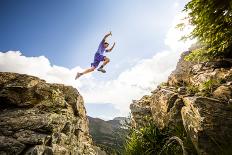 Ben Rueck Catches Some Air During A High Mountain Trail Run Just Outside Marble, CO-Dan Holz-Photographic Print